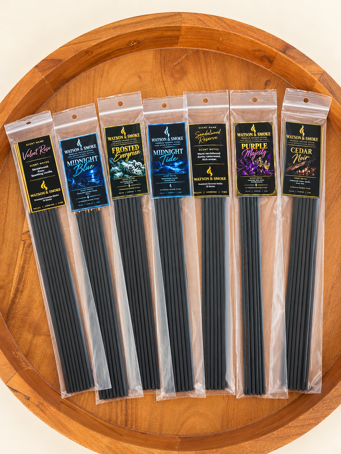 Watson & Smoke incense collection in a wooden tray. Each 15-stick bag sold separately.